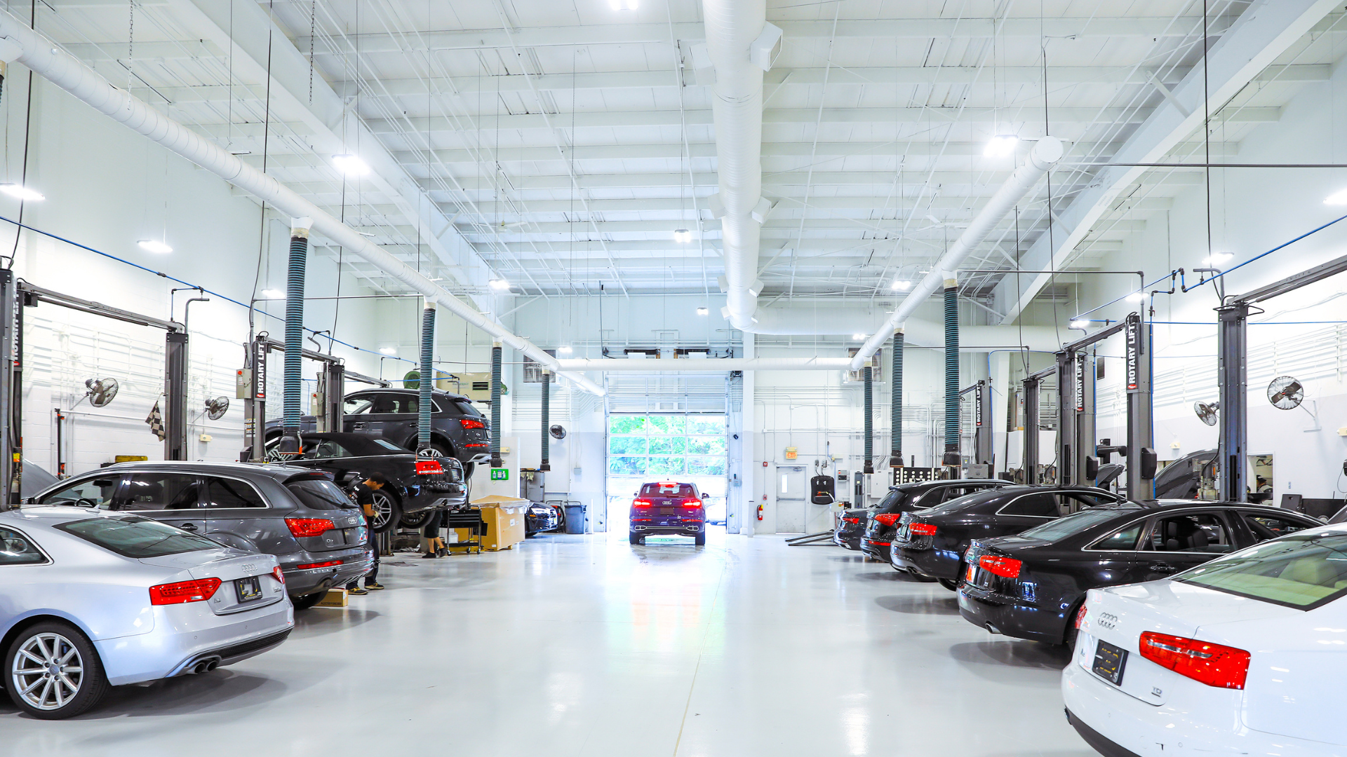 Front profile view of an Audi Q5 vehicle being serviced.